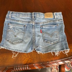 Levi’s girls jean shorts (self distressed)